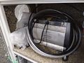 Jun Air OF302-25M Instructions, condensate container (bubble wrapped) and air line inside compressor.jpg