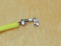 Crimp wire pulling out close up.png